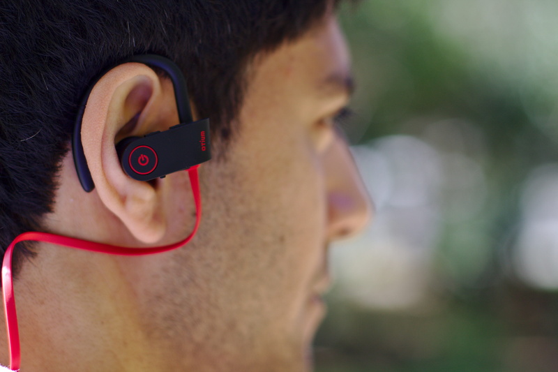 close-up, focus on foreground, human face, wireless technology, mid adult, young adult, lifestyles, headshot, earphones, portable, communication, one person
