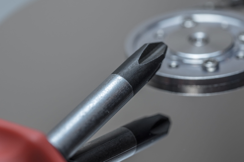 digital, sata, work tool, high angle view, indoors, inner workings, screwdriver, studio shot, chip, cut out, magnetic heads, memory chip, tool, steel, silver colored