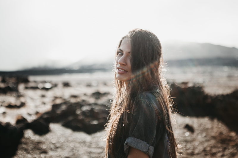 enjoyment, top, backlight, happiness, one Person, smiling, mature, bliss, portrait, rock - Object, grey, beach, cheerful, human Hair, beauty, young Adult
