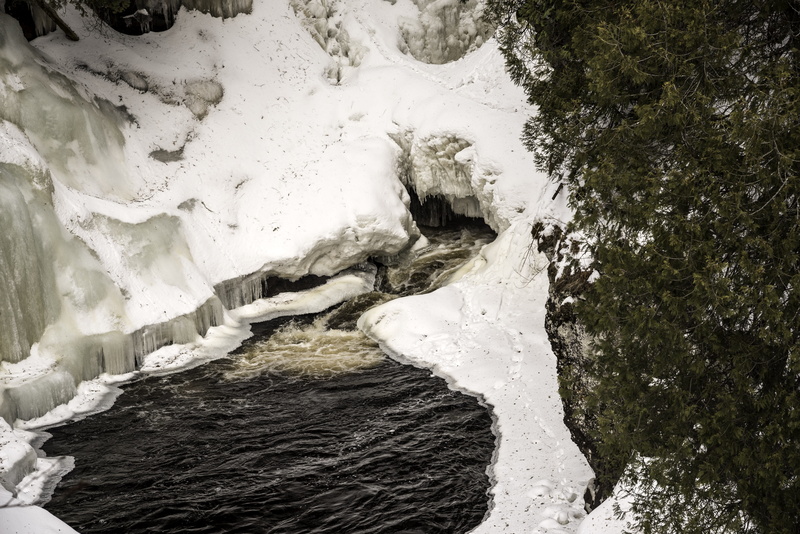 flowing water, solid, outdoors, coming out, water, state, waterfront, waterfall, cave, river, tranquil scene, pool, United States, frozen, scenics, flowing