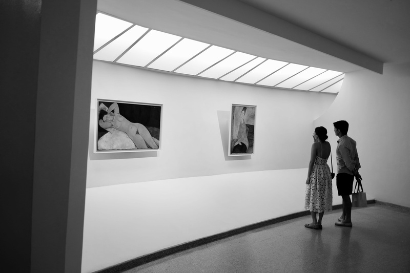 manhattan, indoors, people, black and white, visit, couple - relationship, window, standing, nyc, museum, ceiling, new york, lifestyles, guggenheim, full length