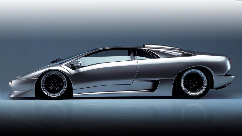 sports car, no people, studio shot, motor vehicle, silver, wealth, luxury, 1080P, silver colored, indoors, modern, transportation, shiny, personal land vehicle