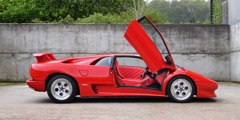 sports car, red, no people, architecture, Lamborghini Diablo, outdoors, retro styled, stationary, red cars, garage, 5K, car, toy, wall - building feature