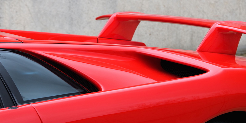 land vehicle, motor vehicle, no people, side-view mirror, Lamborghini Diablo, street, mode of transportation, car, empty, outdoors, wheel, consumerism
