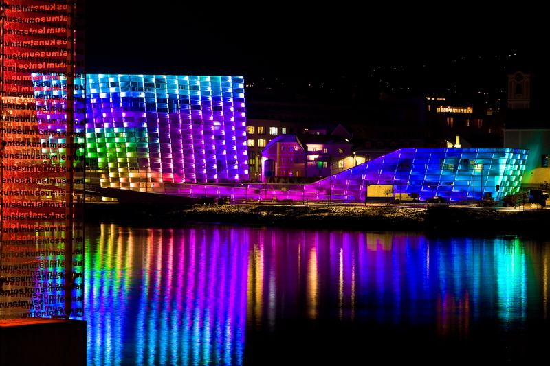 river, lighting, office building exterior, built structure, linz, ars electronica center, light - natural phenomenon, building, city, waterfront, outdoors