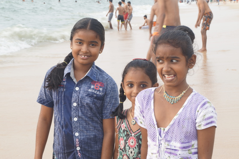 looking at camera, alappuzha, women, shore, child, sea, pre-adolescent child, togetherness, leisure activity, real people, females, travel, beach, blue