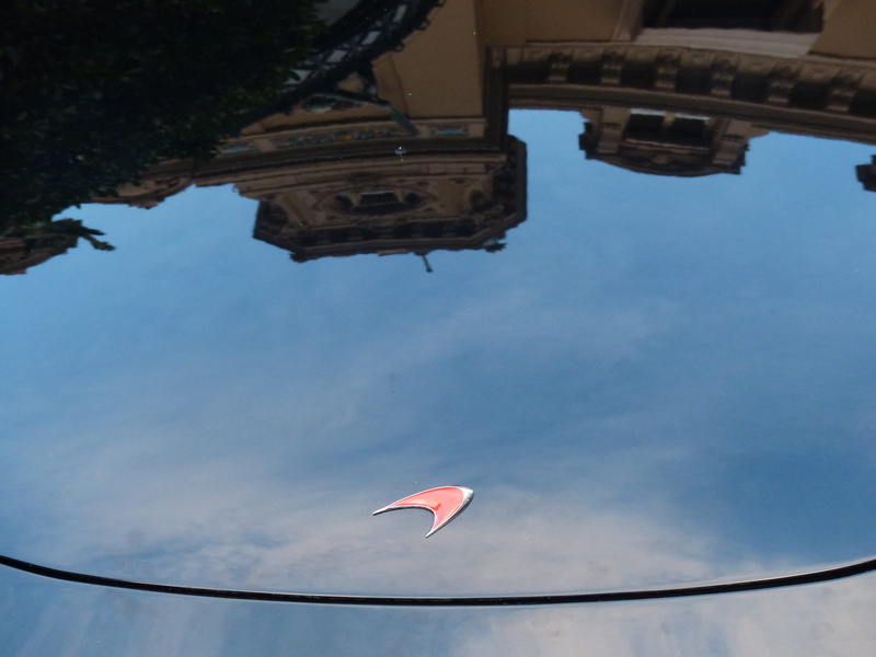flag, building exterior, low angle view, transportation, blue, parachute, adventure, Auto, day, no people, mirroring, black, flying, Mclaren, outdoors