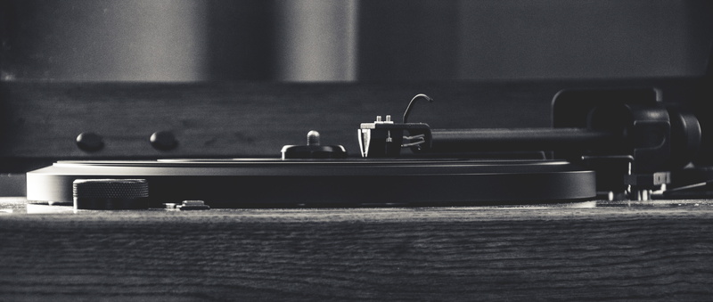 black, home interior, domestic room, room, table, plumbing fixture, selective focus, still life, monochrome, rifle, gun, bumper, black and white, arts culture and entertainment