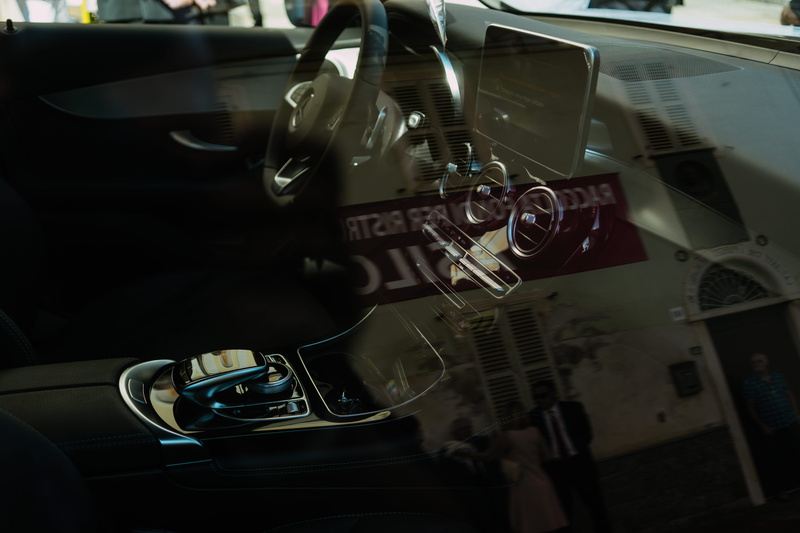 engine, selective focus, speed, vehicle, automotive design, steering wheel, transportation system, desk, console, close-up, small, automotive exterior