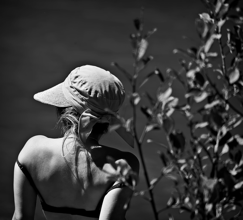 one person, headshot, switzerland, waist up, flower, rear view, leisure activity, hairstyle, water, summer, day, real people, focus on foreground, outdoors