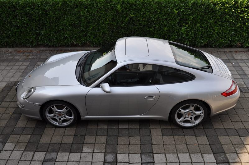 white color, sports car, automotive, mode of transportation, stationary, motor vehicle, plant, modern, outdoors, car, travel, wheel, auto, transportation