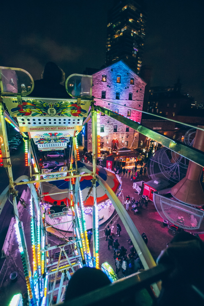 architecture, toronto christmas market, toronto, lifestyles, ferris wheel, group of people, water, carnival, wheel, carousel, indoor play area, transportation