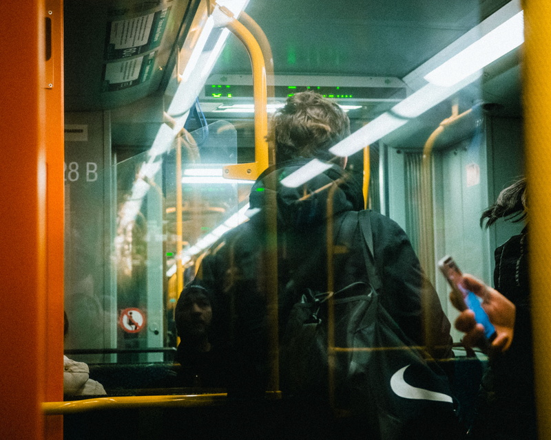 land vehicle, train - vehicle, apparel, transportation, people, coat, hardhat, crypt, men, lifestyles, light, night life, overcoat, long sleeve, vehicle interior