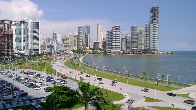 motor vehicle, nature, water, building, panama, built structure, mode of transportation, no people, tall - high, tower, skyscraper, city, architecture