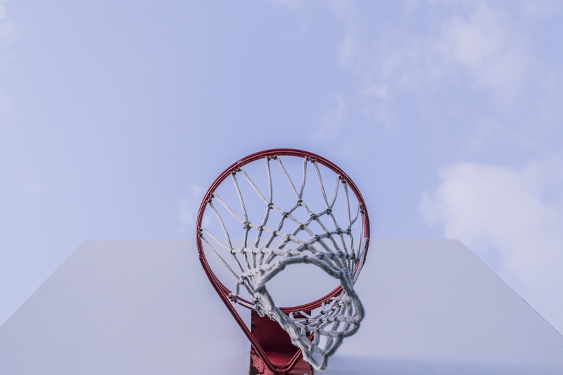 no people, basketball hoop, geometric shape, american, blue, cloud - sky, low angle view, ball, day, hoops, single object, sky, shape, sports equipment