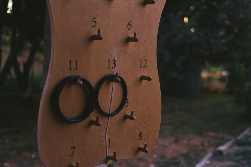 shape, text, hardwood, rings, mandolin, electric guitar, number, tree, wood - material, nature, wristwatch, sign, communication, rack, focus on foreground