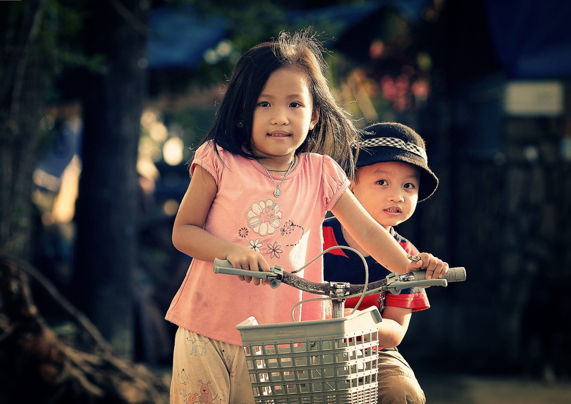 boy, kid, girls, bicycle, emotion, innocence, hand, females, wear, male, child, riding, people, young, siblings, close-up, holding, kids, focus on foreground