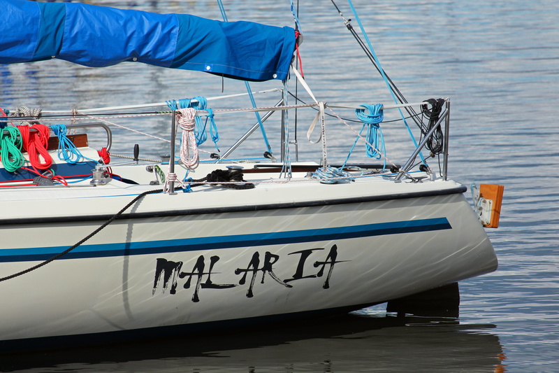 yacht, lifestyle, day, coast, lake, travel, water, outdoors, sail, wind, no people, vacations, ship name, text, malaria, sailing boat, tourism, nautical vessel