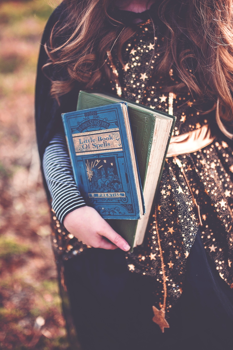 communication, magic, adult, real people, outdoors, women, witch, person, star, leisure activity, kids costume, publication, halloween witch, halloween