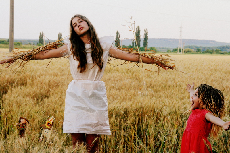 brown hair, rural scene, beside, happiness, fashion, two people, beautiful woman, people, agriculture, plant, land, standing, girl, hair, field, dress