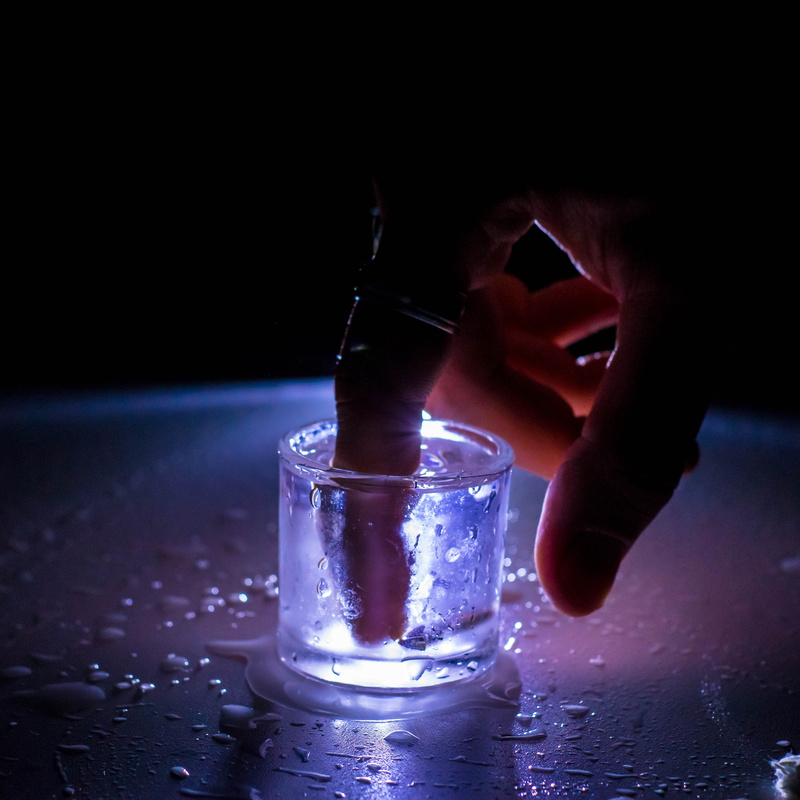 one person, real people, indoors, glass, body part, food and drink, liquor, hand, whiskey, life, vacation, vodka, emotions, holiday, alcohol, unrecognizable person