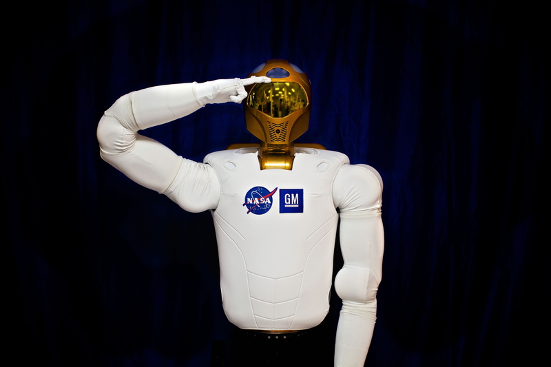 plastic, american football - sport, rear view, exploration, nasa, hand, copy space, saluting, editorial, mask - disguise, dexterous, robot, unrecognizable person
