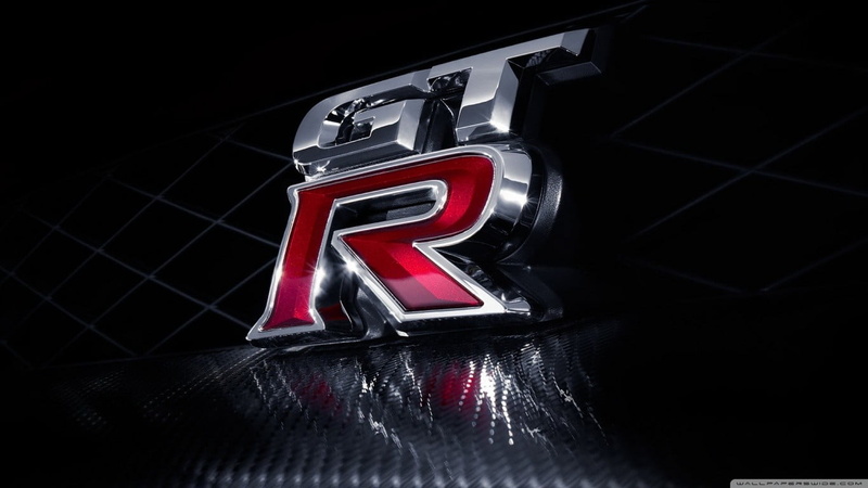 sign, no people, communication, reflection, car, logo, Nissan, indoors, western script, close-up, gtr, neon, Nissan GT-R, low angle view, number, illuminated