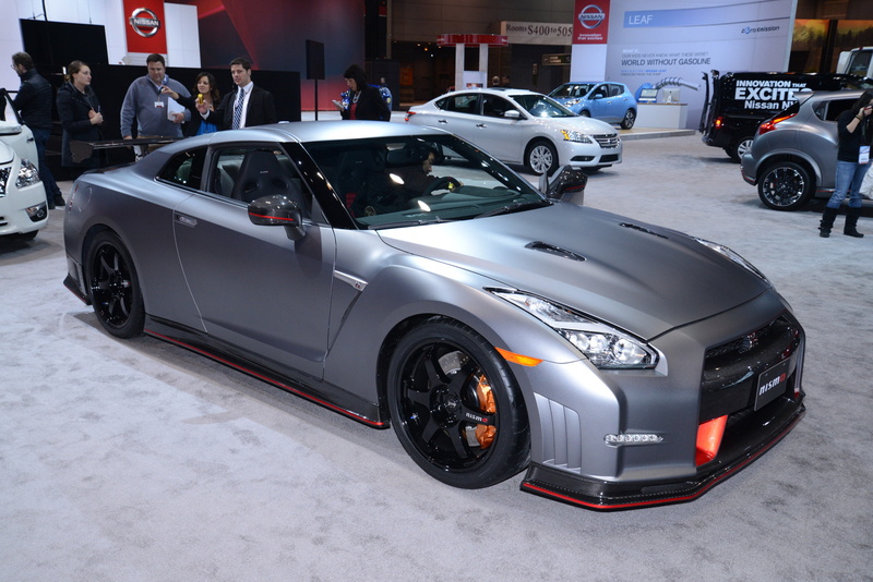 nissan, land Vehicle, transportation, technology, exhibition, motor Vehicle, white color, incidental people, gtr, expense, luxury, retail, new, coupe, architecture