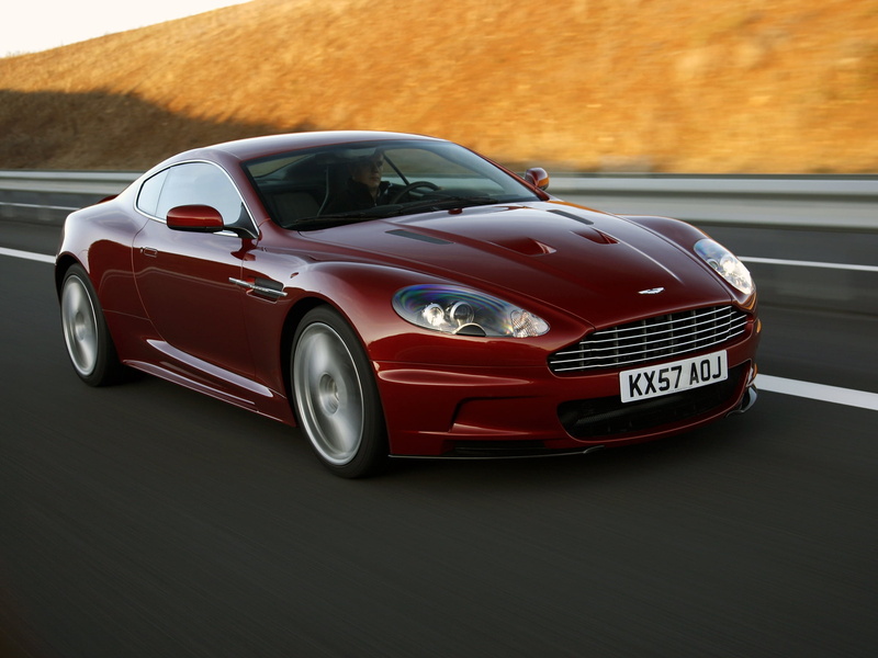 street, outdoors, land Vehicle, super - Film Title, racecar, mode of Transport, mode of transportation, sport, aston, speed, aston martin, power, status Car