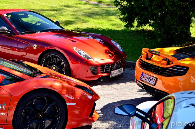 plant, sports car, multi colored, McLaren MP4-12C, street, day, stationary, mode of transportation, nature, outdoors, land, land vehicle, parking, no people
