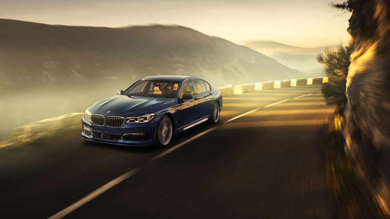 blurred motion, motor vehicle, BMW, land vehicle, sunset, driving, nature, mountain range, mode of transportation, car, speed, sedan, outdoors, on the move