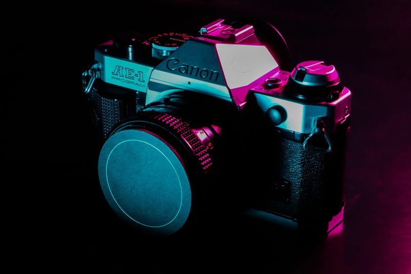 multi colored, camera, ae 1, photography themes, digital camera, studio shot, plant, electrical device, still life, cut out, copy space, camera - photographic equipment