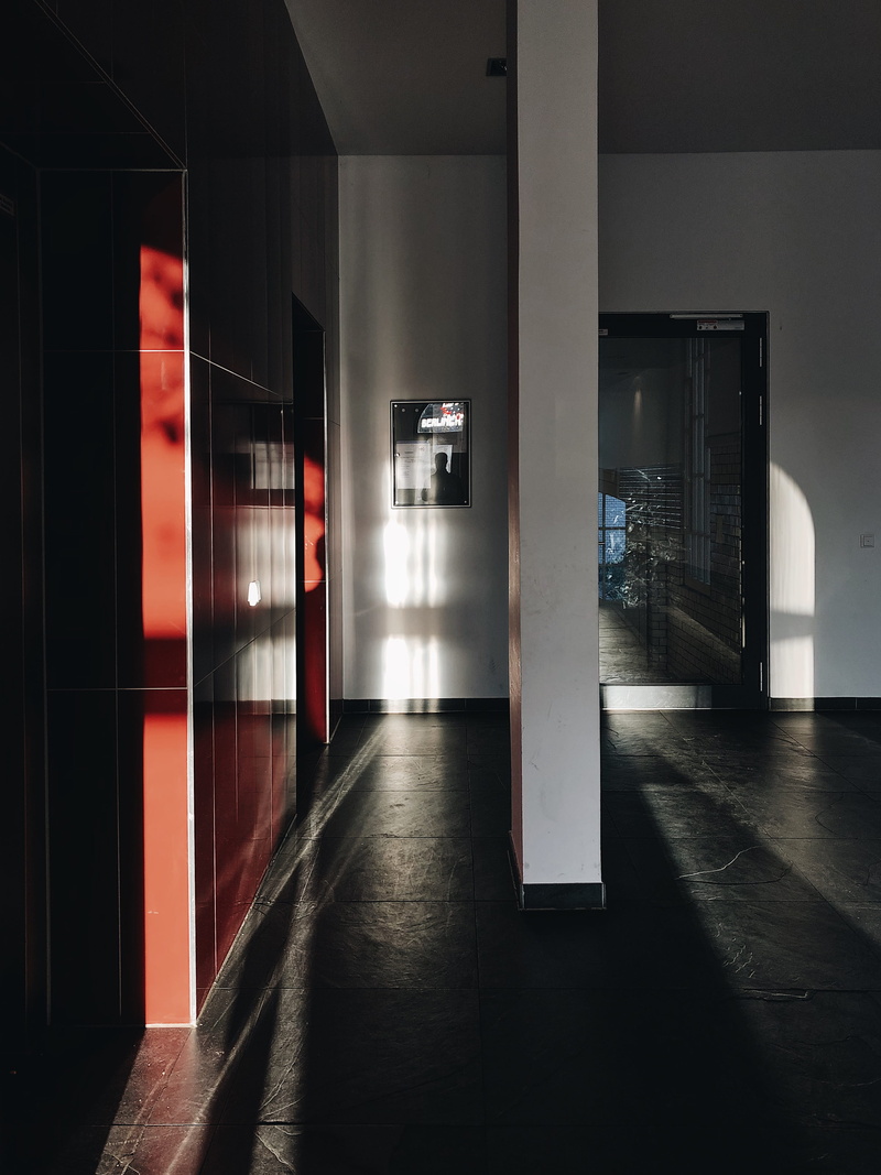 tiled floor, reflection, arcade game machine, floor, lighting equipment, clothing, ipod, glass - material, no people, sliding door, hardwood, germany, apparel