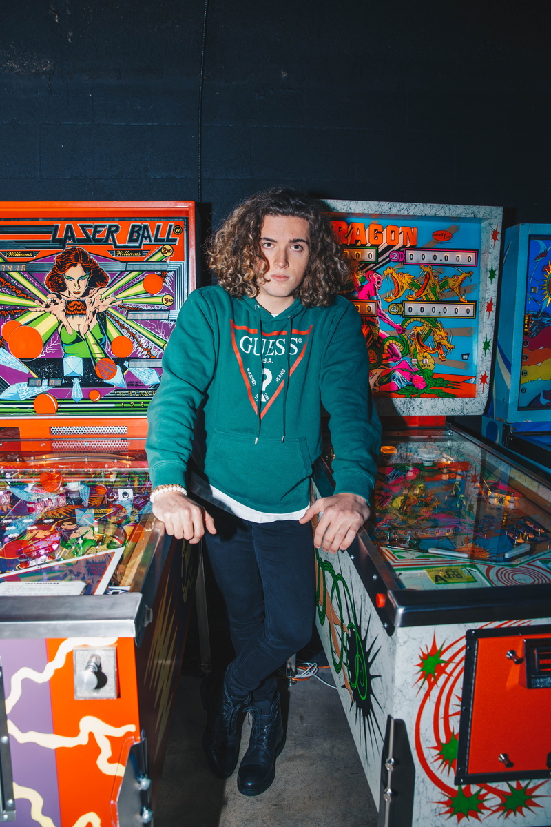 hair, pac man, apparel, crypt, shop, leisure activity, lifestyles, architecture, shoe, crash helmet, clothing, paint container, shelf, casual clothing