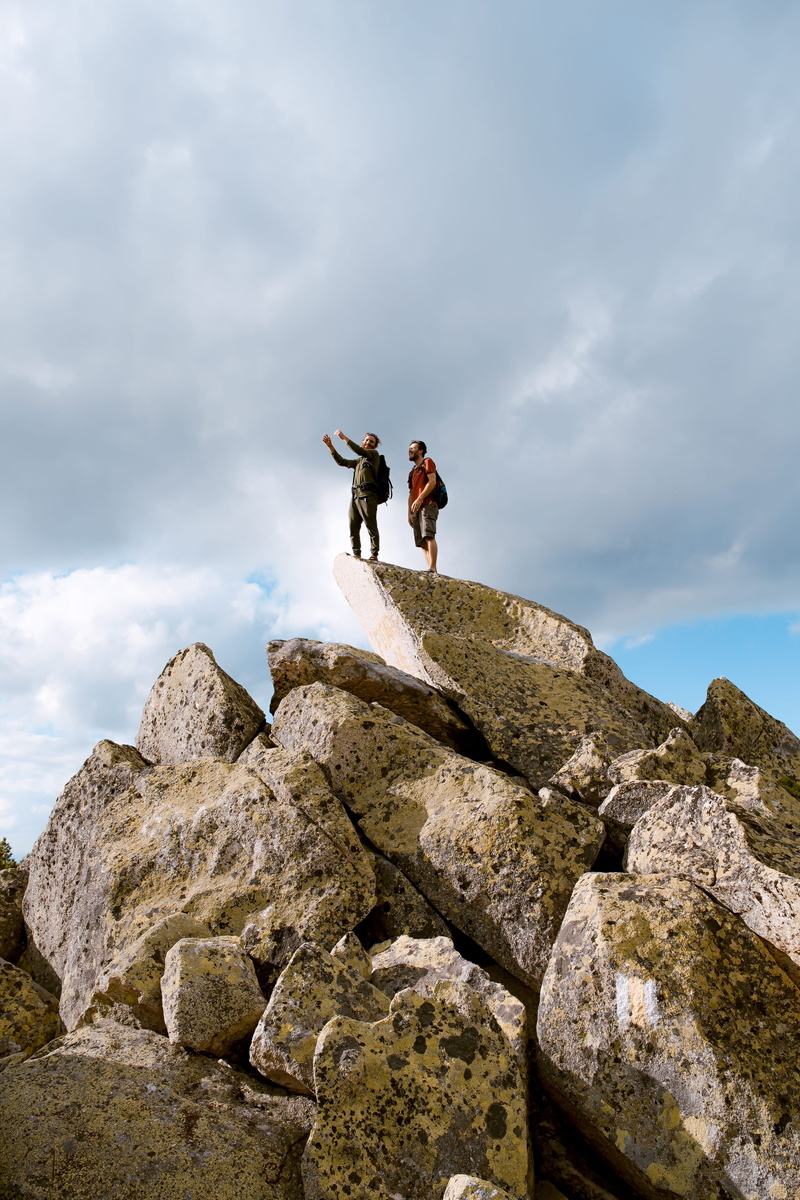 rock, romanium, explore the wild, adult, up the hill, top view, togetherness, rock - object, friend, climbing, cloud - sky, outdoors, men, lifestyles, full length