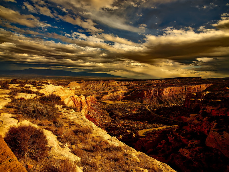 nature, environment, cloud - sky, tranquil scene, rock formation, beauty in nature, mountains, rocky, arid climate, non-urban scene, clouds, rock, scenics - nature