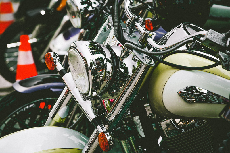 mode of transportation, motorcycle, handlebar, stationary, vehicle part, focus on foreground, ride, lifestyle, transportation, black, land vehicle, gray