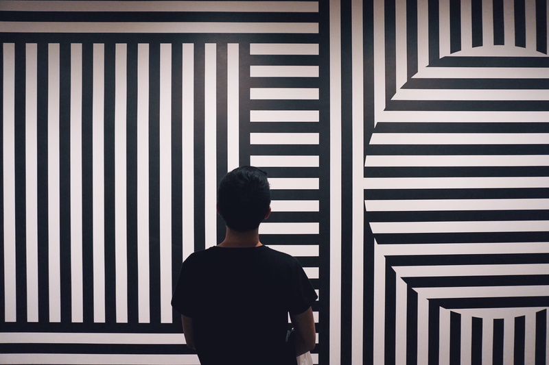 one person, nyc, waist up, standing, wall - building feature, pattern, built structure, the met, modern art, real people, architecture, sunlight, the met new york