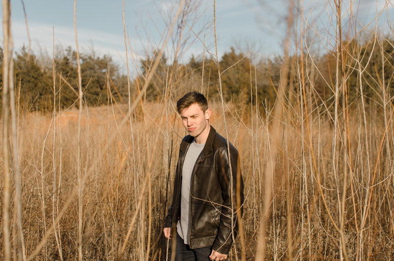 waist up, land, leisure activity, landscape, portrait, standing, human, outdoors, jacket, leather jacket, lifestyles, scenery, one person, leather, person