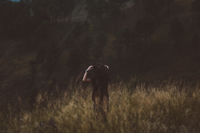 nature, plant, black, day, lifestyles, adult, land, casual clothing, field, sport, real people, green, standing, beauty in nature, men, brown, black shirt