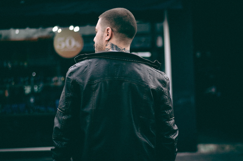 real people, leisure activity, lifestyles, looking, clothing, one Person, adults only, waist up, only men, shaved head, man in black, strength, mature adult