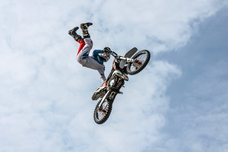 risk, cloud - sky, jump, extreme sports, style, stunt person, performance, sport, leisure activity, jumping, ride, speed, competition, full length, adventure