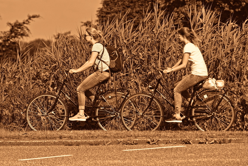 cycling, riding, biker, full length, transport, outdoor, lifestyles, bound for, mode of transportation, person, travel, transportation, woman, adult, two people
