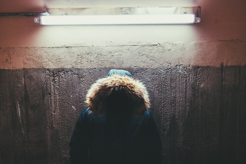nature, hanged, lamp, one person, indoors, coat, real people, waist up, illuminated, 5K, unrecognizable person, wall - building feature, hair, fluorescent