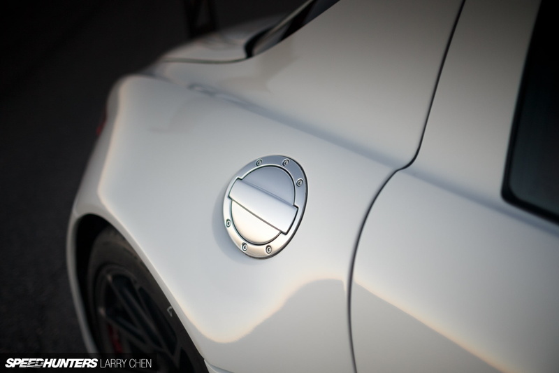 transportation, close-up, car door, Mercedes-Benz SLS AMG, high angle view, side-view mirror, 1080P, sunlight, reflection, stationary, land vehicle, travel