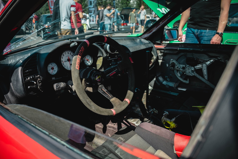 tuning, drift, exterior, motor, sport car, car, red, repairing, transportation, steering wheel, stationary, car show, outdoors, land vehicle, engine, men