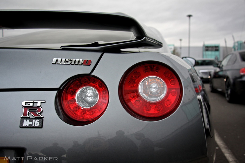 road, transportation, sign, travel, Nissan, mode of transportation, tail light, air vehicle, communication, motor vehicle, Nissan Skyline GT-R R35, lighting equipment
