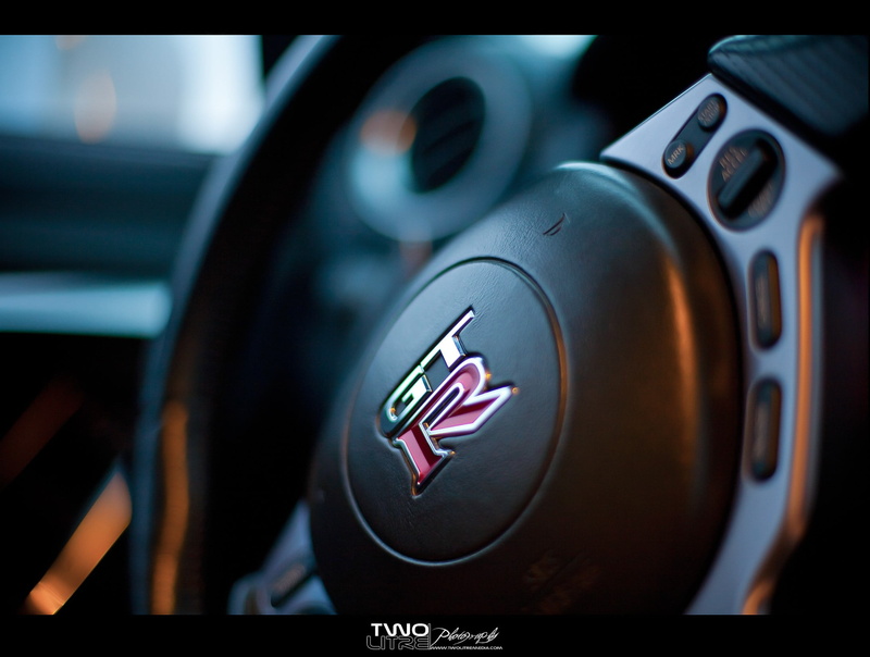 text, communication, transfer print, luxury, close-up, car, vehicle interior, motor vehicle, technology, number, car interior, western script, indoors