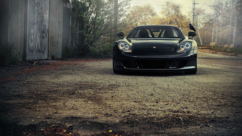 mode of transportation, black, city, Porsche, built structure, no people, outdoors, garage, motor vehicle, street, crow, coupe, parking, plant, car, road