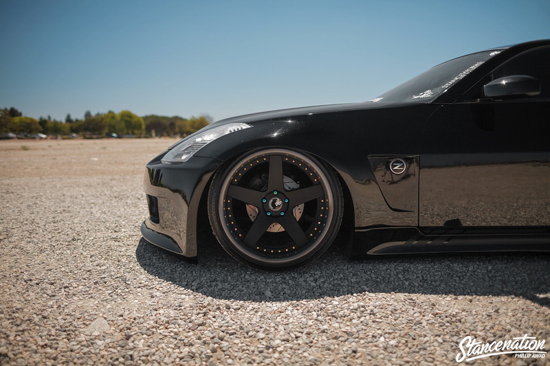 blue, clear sky, sky, no people, day, sunlight, tire, motor vehicle, outdoors, luxury, wheel, 720P, wealth, stationary, road trip, nissan nissan 350z stance stanceworks stancenation